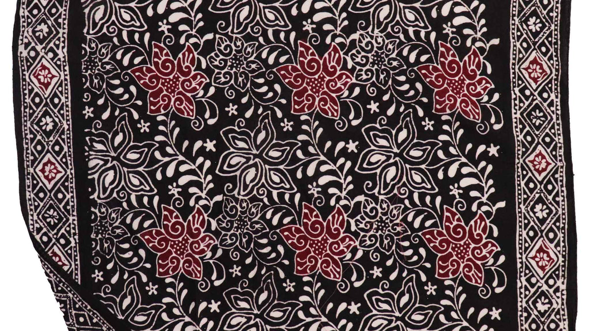 Kasih Co-op hand-dyed, hand-stamped batik bandana in Black Red Star pattern