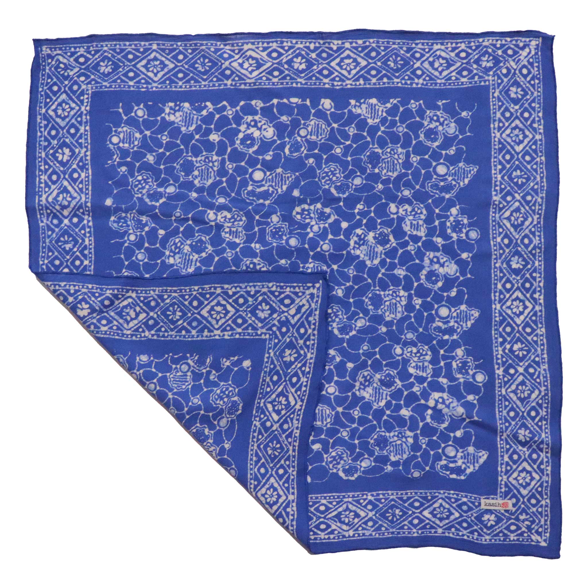 Blue bandana with white patterns on a white background