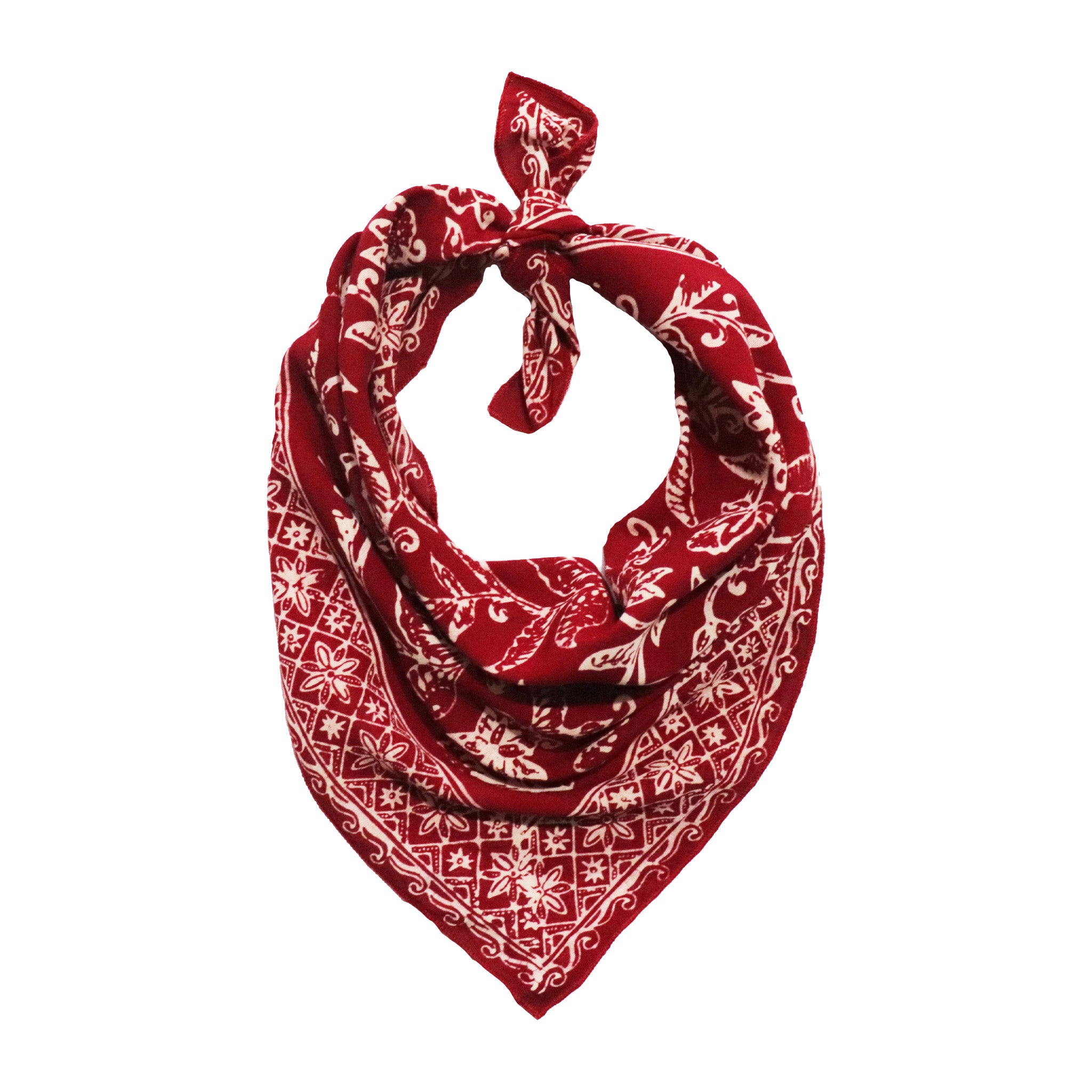 Red bandana with white patterns on a white background