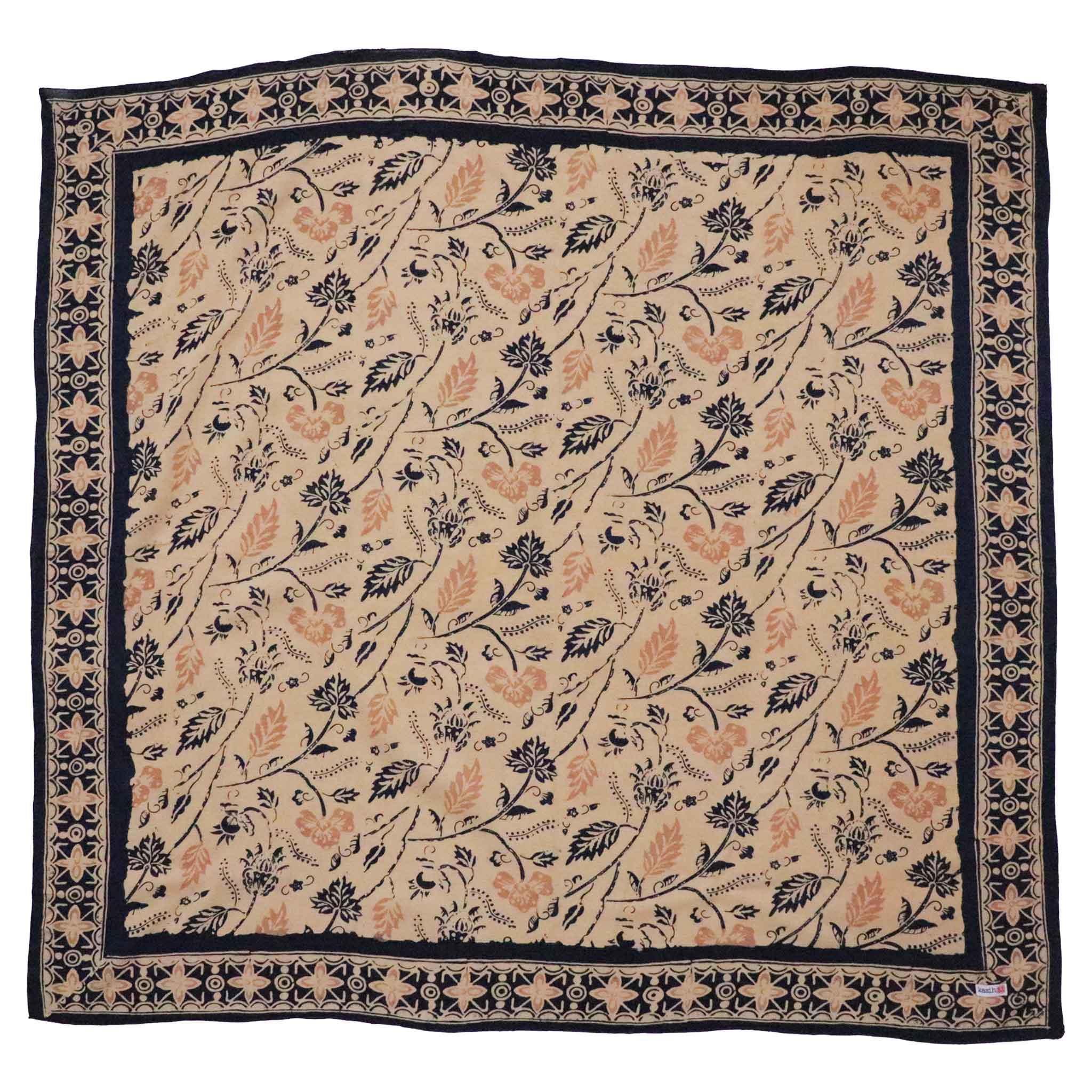 Floral patterned bandana square with black border on beige background