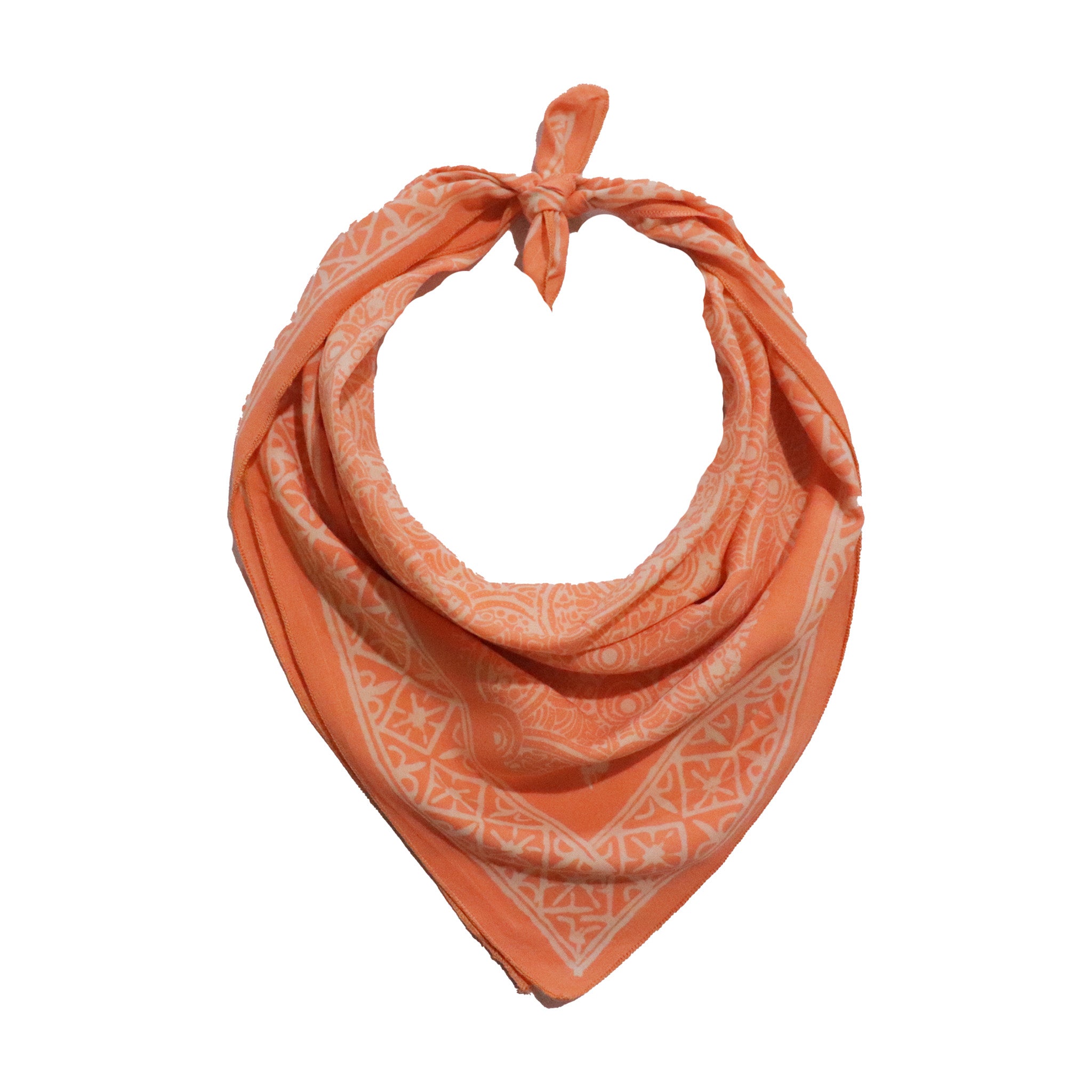Coral bandana with white geometric pattern on a white background