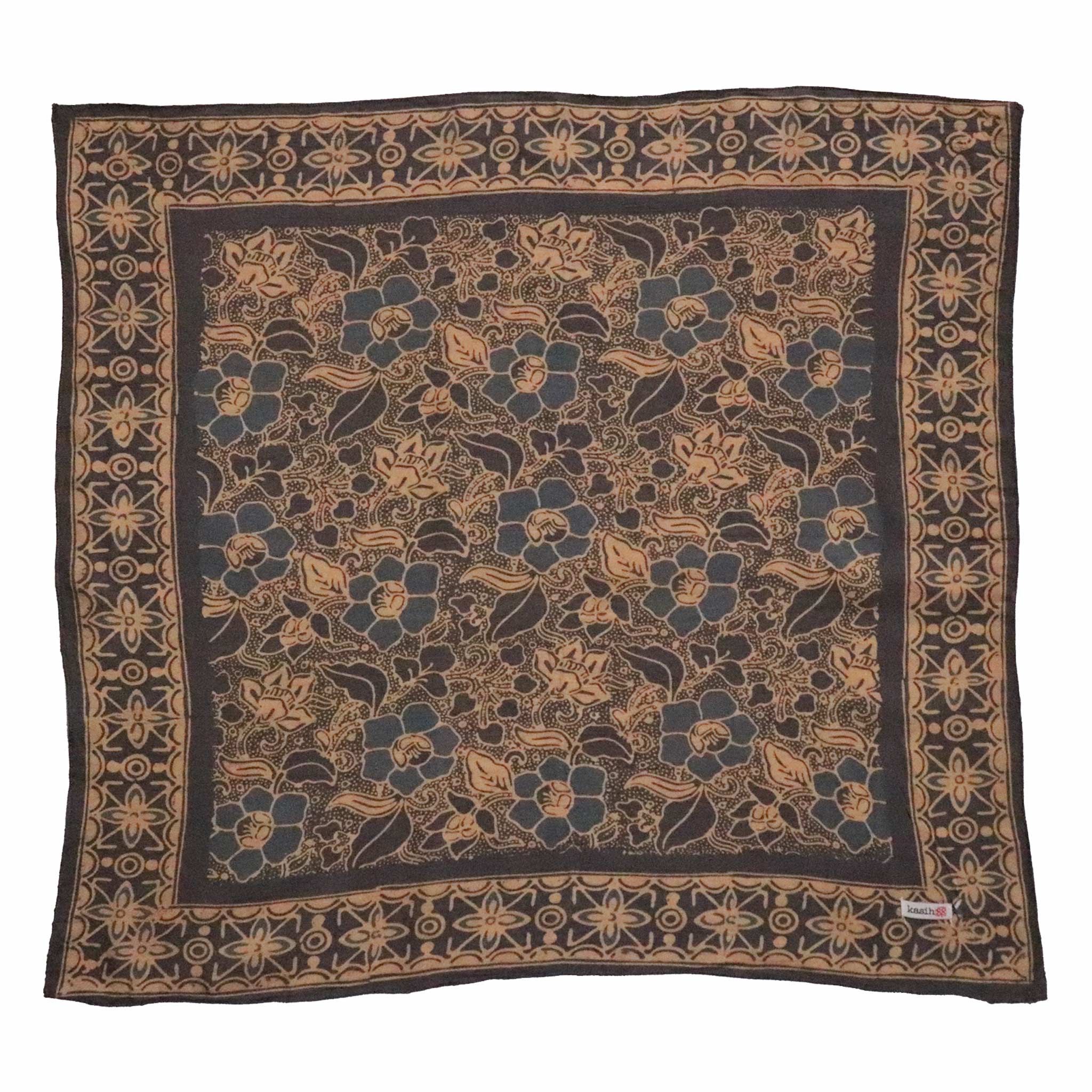 Floral patterned batik cotton bandana with a border on a white background