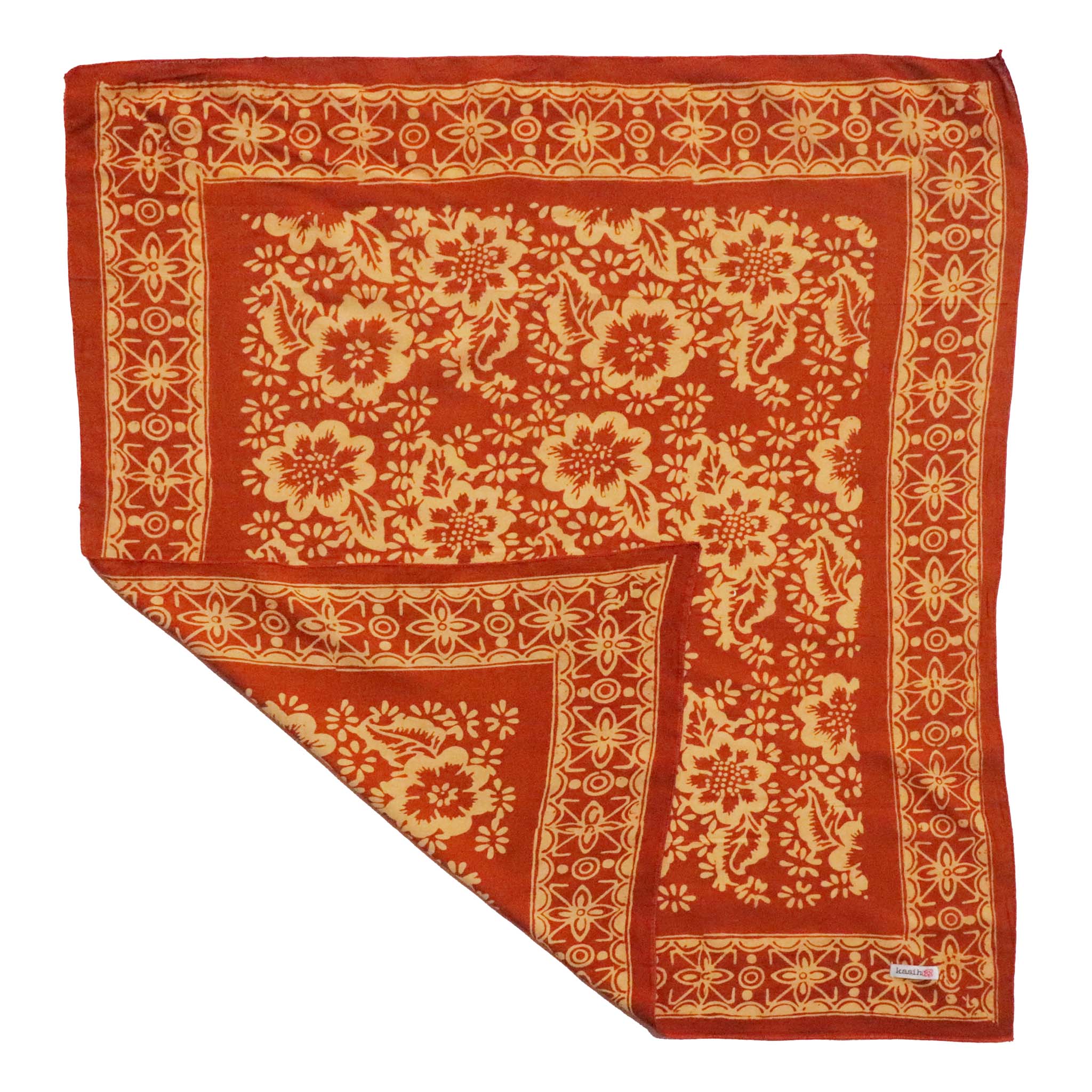Red orange scarf with beige floral pattern on a white background