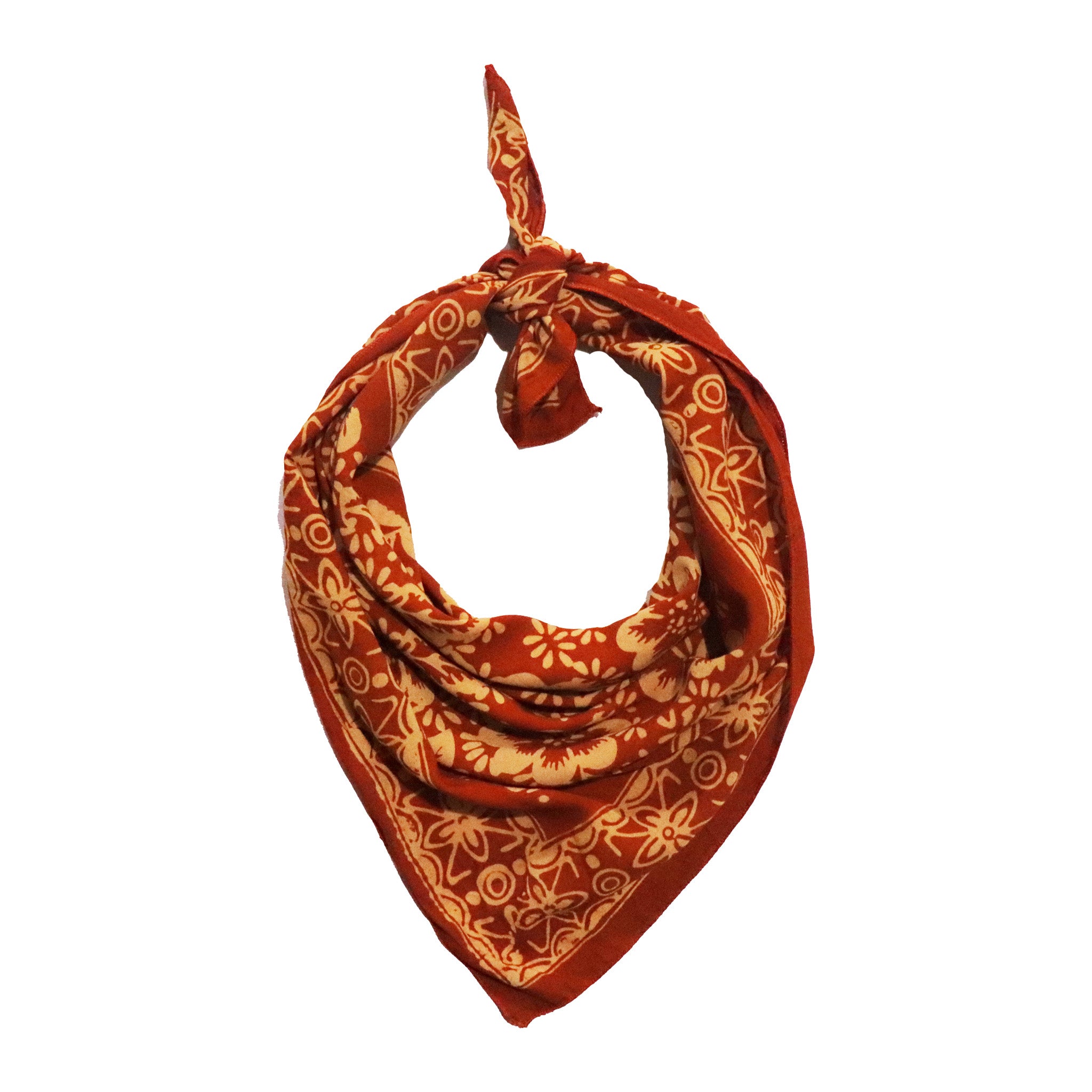 Red orange scarf with beige floral pattern on a white background