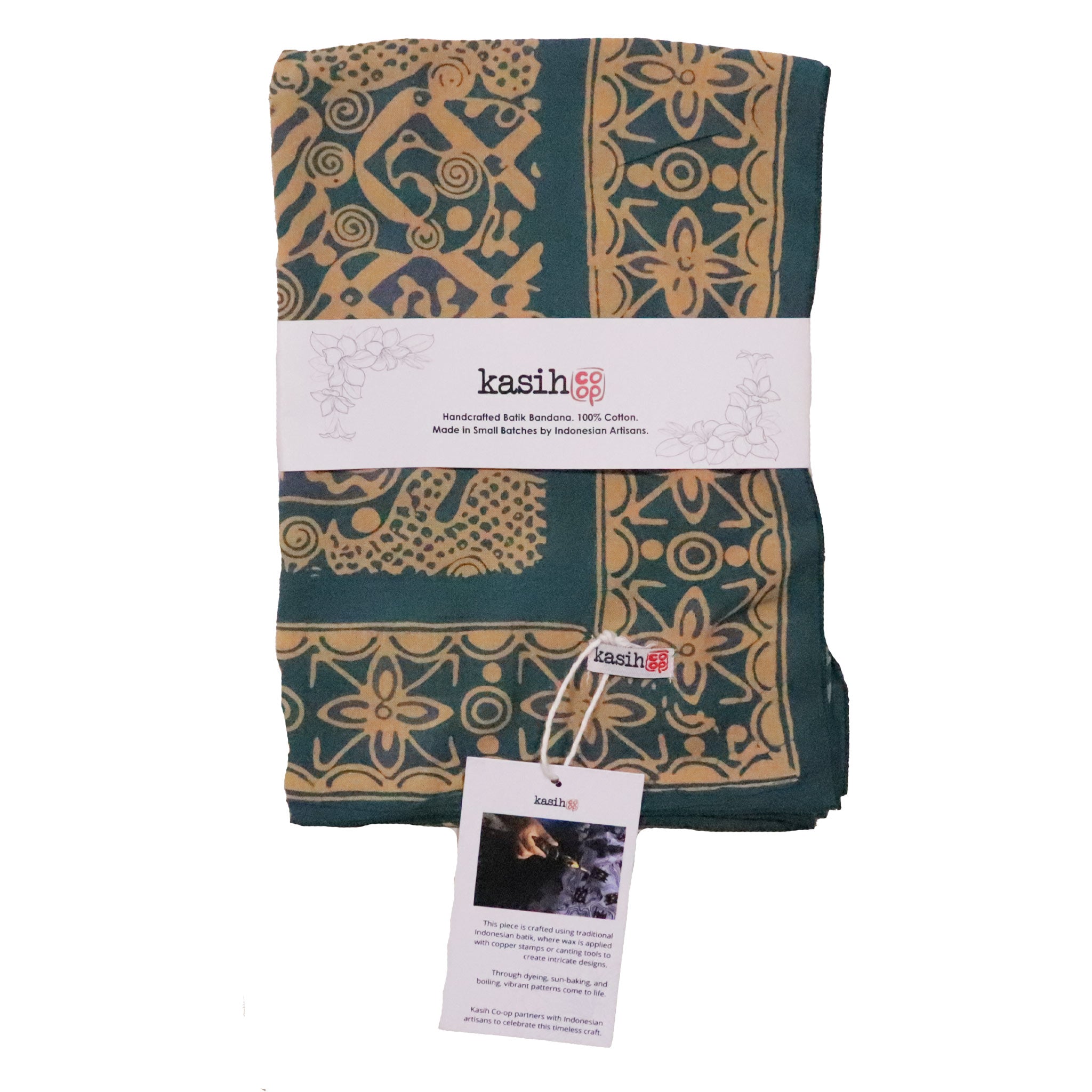 Folded fabric with teal and gray patterns on a green background, branded 'kasih'.
