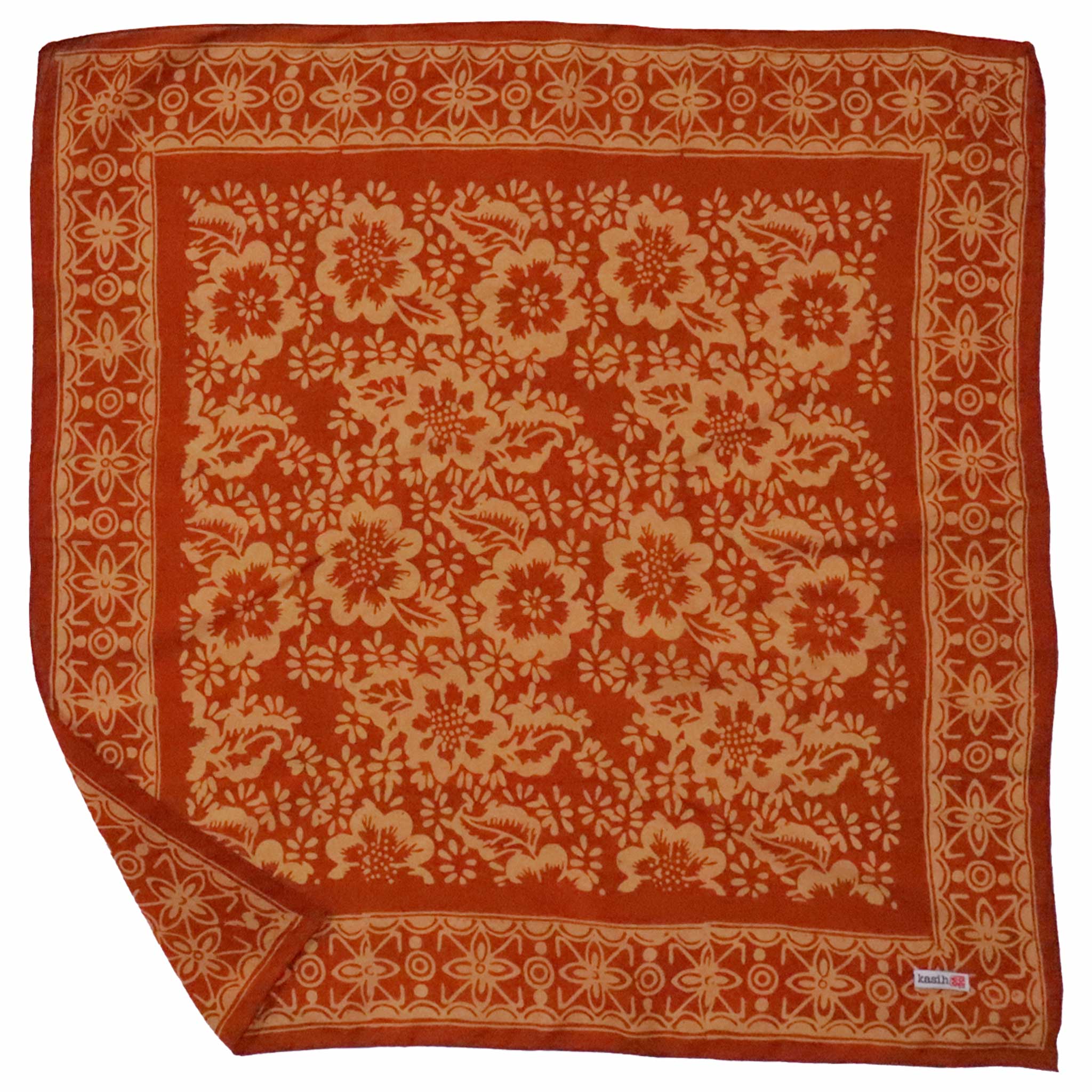 Red orange scarf with beige floral pattern on a white background
