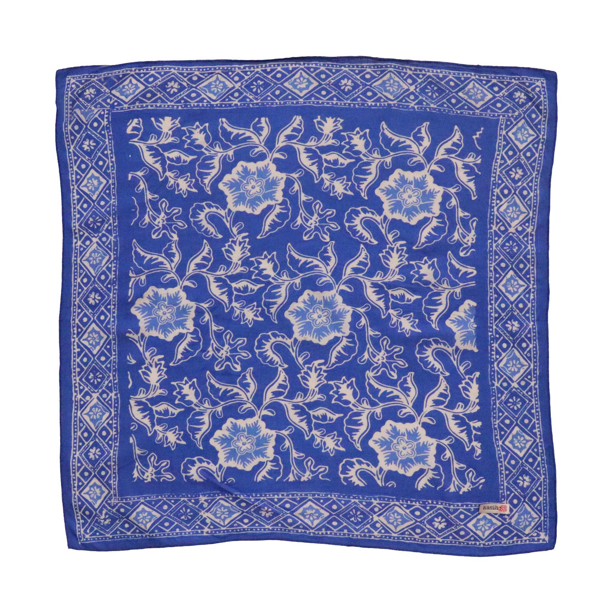 Blue scarf with white floral pattern on a white background