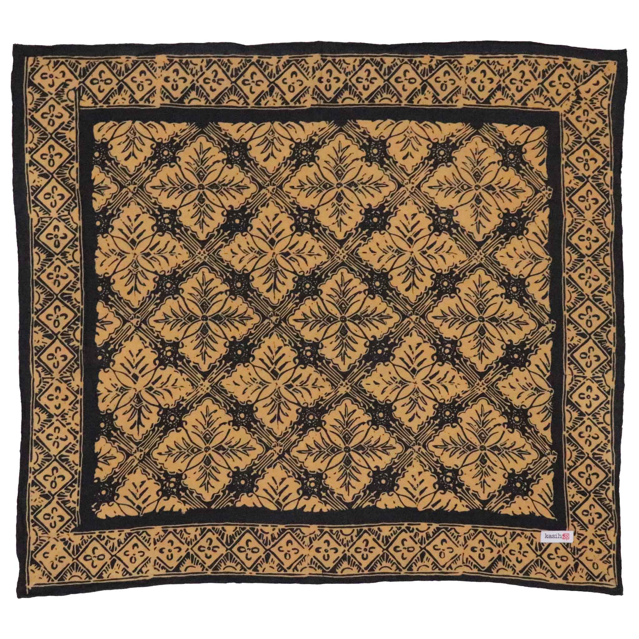 Decorative black and beige patterned cotton banda with a brand kasih co-op label in the corner