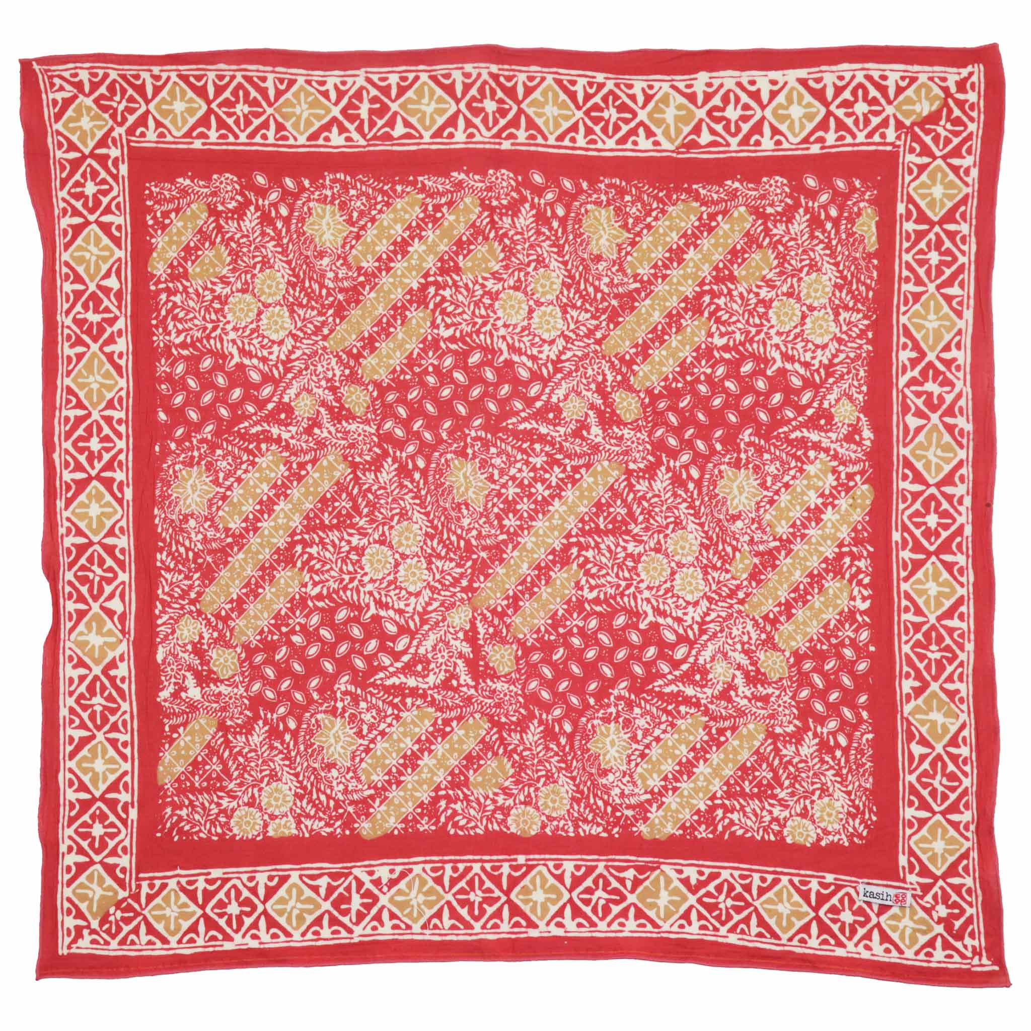 Pink batik bandana with gold and white pattern on a white background