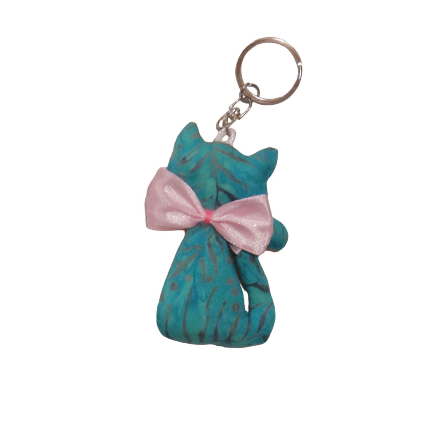 Teal cat-shaped keychain with a pink bow on a white background