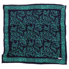 Teal patterned kasih co-op batik bandana on a white background