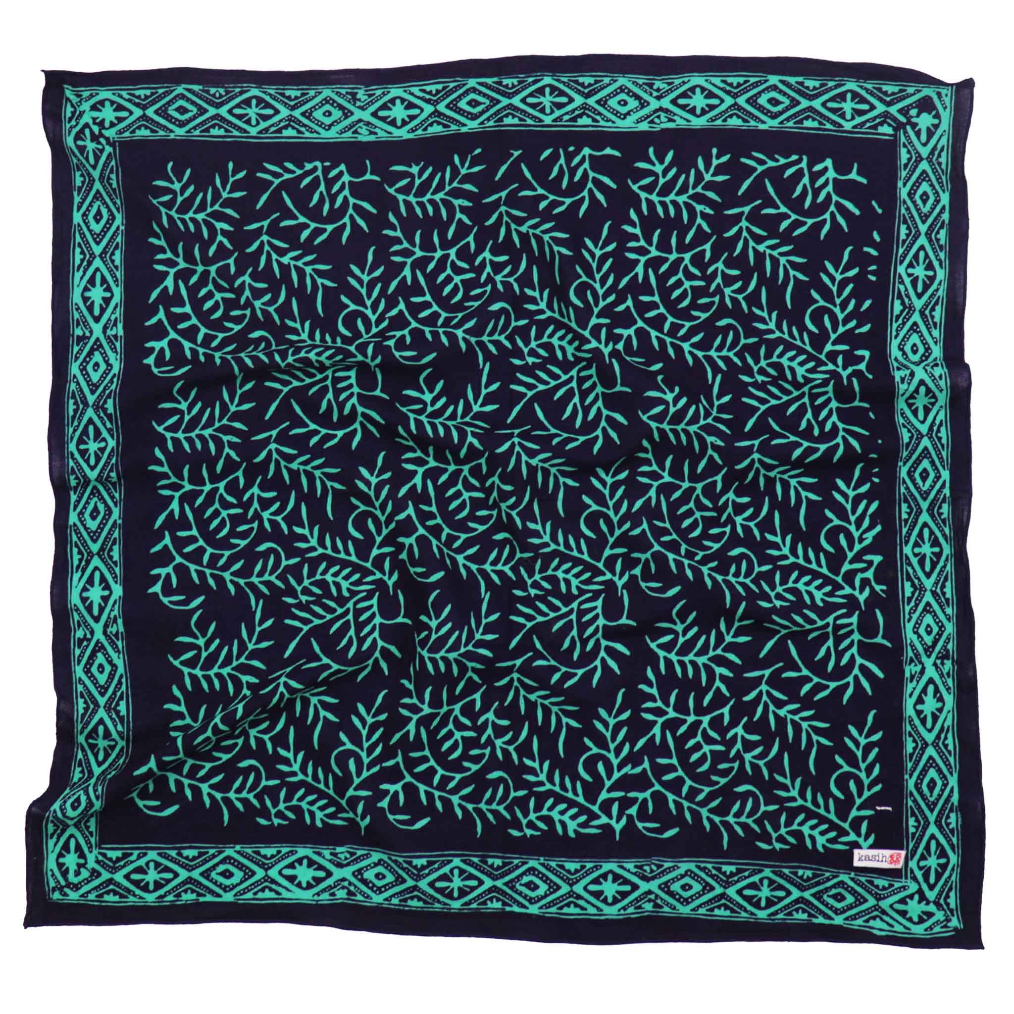 Teal patterned kasih co-op batik bandana on a white background