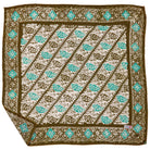 Patterned batik bandana with green and brown design on a white background