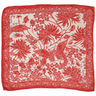 Red bandana with white floral and butterfly pattern