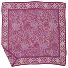 Purple floral patterned bandana with white border on a white background